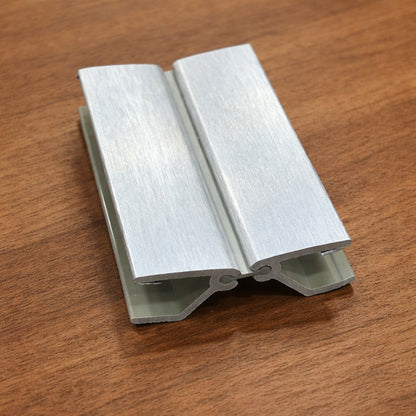 Conector de zocalos 100mm angulo varible Aluminizado